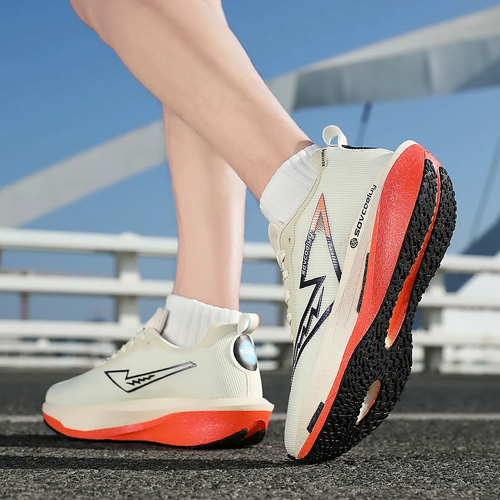 Runner wearing the cream and coral Sovcoeluy Velocity Runner on the road