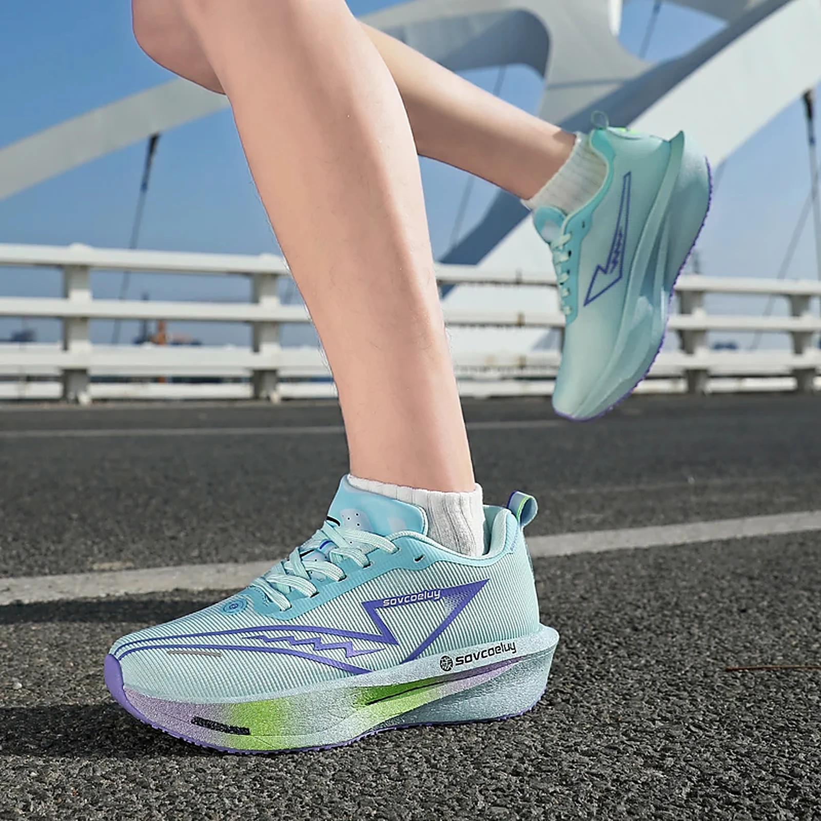 Runner wearing the ice blue Sovcoeluy Velocity Runner mid-stride